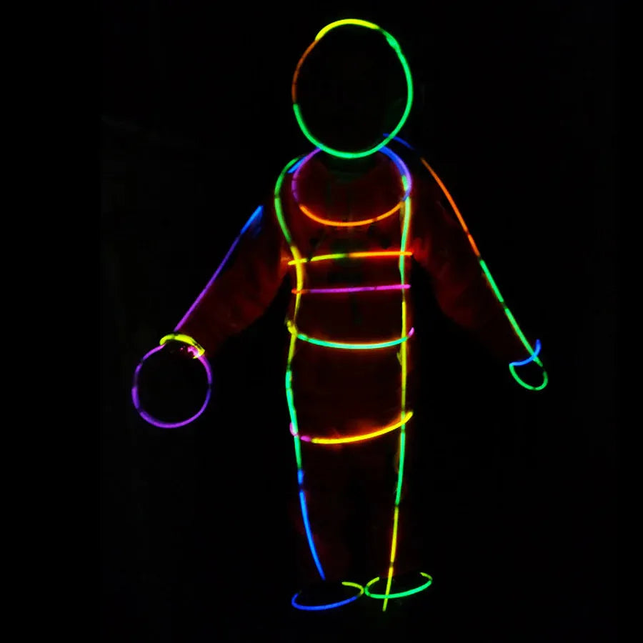 Colorful glowing outline of a person against black background – neon glow sticks effect for kids’ parties